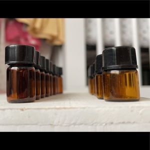 empty mini essential oil bottles